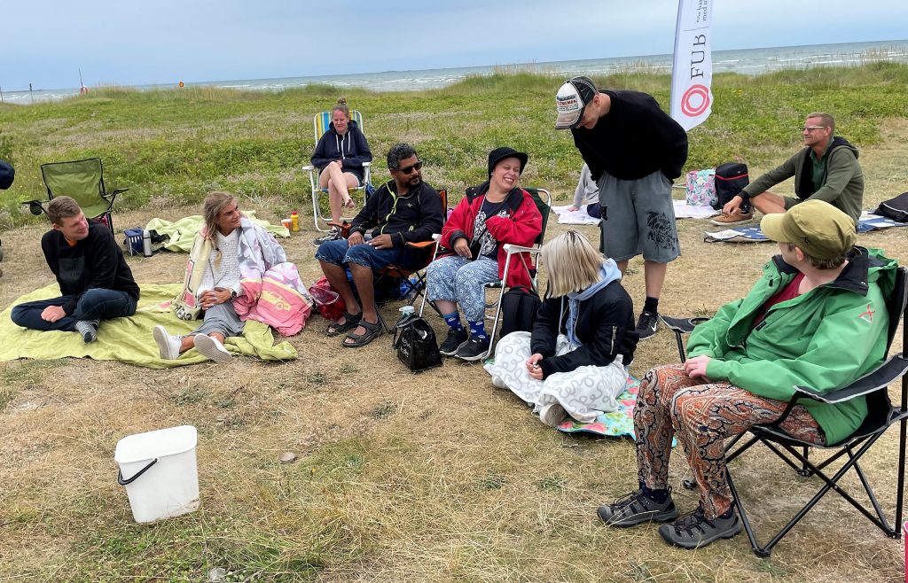 Deltagare på stranden