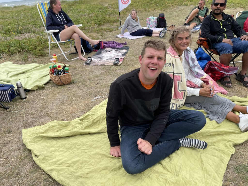 Deltagare på stranden
